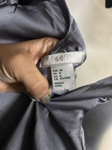 Gray Sleeveless Blouse with Bow