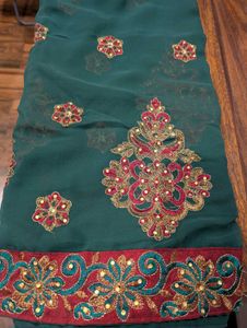 Elegant Green Sari with Intricate Embroidery