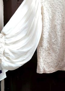 white top with heavy balloon sleeves