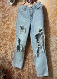 Distressed Light Wash Denim Jeans
