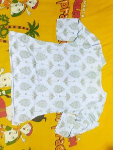 Front Knot Short Kurti Top With 3/4 Sleeves.