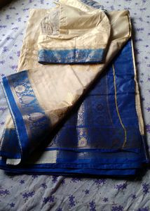 PUJA WEAR GORGEOUS WHITE AND ROYAL BLUE SAREE