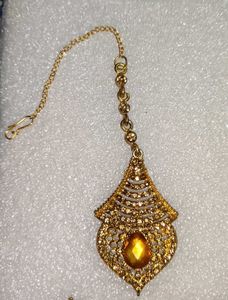 Elegant Gold Toned Drop Earrings and Maang Tika