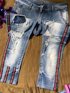 Ripped Jeans with Striped Detail