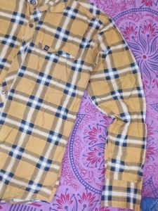 A Yellow Colour Black Checked Shirt. With Sapkry Brand. With M Sized