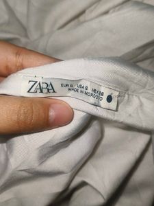 Chic White One-Shoulder Bodysuit