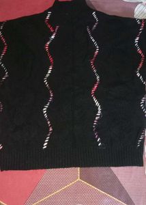 Cozy Black Knit Sweater with Wavy Trim