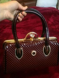CLEARANCE SALE....Elegance Branded Hand Bag