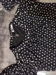 Black Top With White Pearl On The Neck