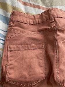 skinny jeans peach coloured. only used twice