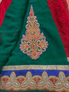 Elegant Rad Embroidered Saree