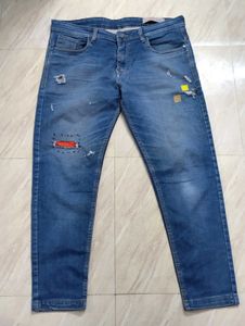 Distressed Denim Jeans with Patches