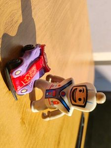 Toy Car and Spaceman Figurine