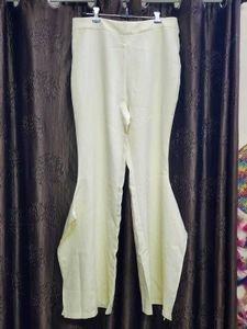 Yellow Ruffle Hem Flare Pants