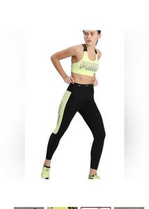 PUMAWomen Sports Lightly Padded Bra (Yellow)
