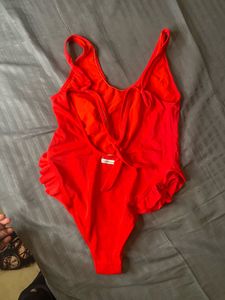 red bodysuit