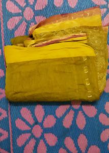 Yellow Saree With Golden Design