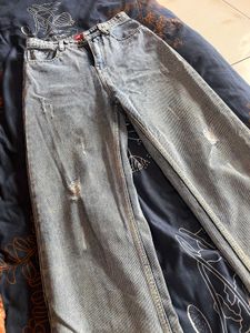 Ripped Light Wash Denim Jeans