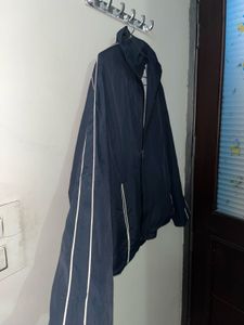 Navy Windbreaker Jacket With White Strips On Arms