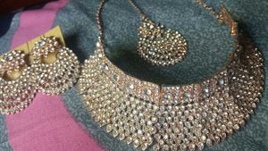 *Rose Gold Kundan Jewelry Set with Clear Stones*