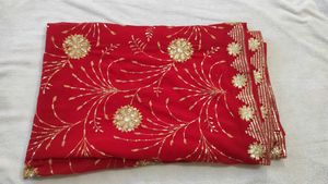 Radiant Red Saree with Intricate Gold Sequins