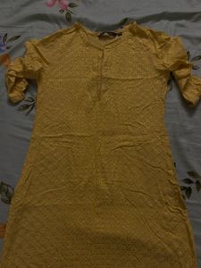 Yellow Kurti with Subtle Detailing