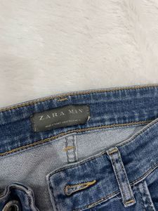 ZARA Ripped Knee Jeans