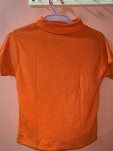 Orange Ribbed Mock Neck Top