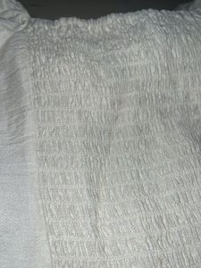 White puff sleeve tie-front top