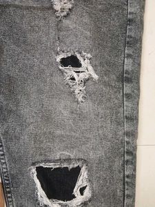 Ripped Gray Wash Jeans
