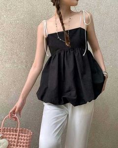 Black Tie-Strap Peplum Top