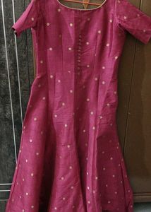 A Majenta Ethnic Gown...