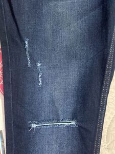 Ripped / Distressed Navy Blue Jeans