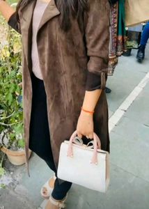 Check out this adorable pastel-colored handbag