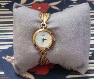 Vintage Raga Titan Gold Watch