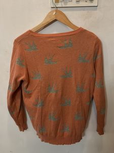 Orange Sweater With Silver Bird Print