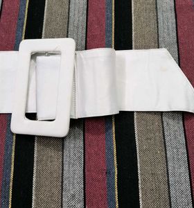 This is a very beautiful white colored cloth belt