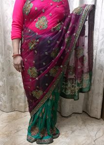 net saree with superb contrast with blouse