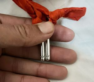 This is an Adidas x Rita Ora navy floral pullover