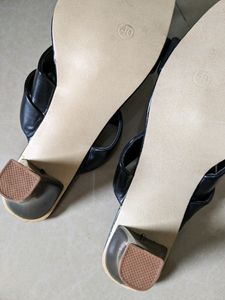 Never used Heels. Selling Because Of Size