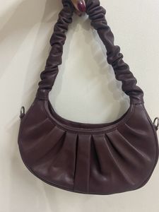 a beautiful chocolate-ish coffee brown sling bag