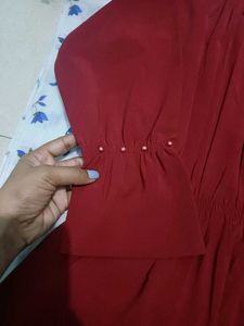 Burgundy blouse with pearl detail