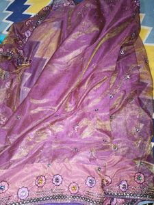 Net saree in purple colour havingg 2 shining shade