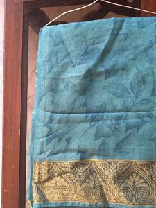 Blue Net Saree With Cream Border