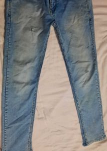 Light Wash Distressed Denim Jeans
