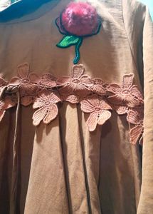 Elegant Brown Tunic with Floral Detail