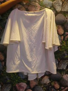 A Flaired Off White Top.