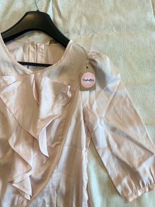 Peach Ruffle Top🤍