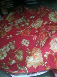 Floral Bedsheet have a medium size hole