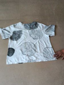White Breezy top But one Sleeves Has flaws